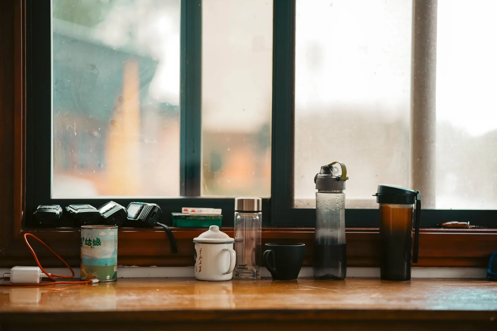 How much do window companies charge per window for vinyl, wood, and fiberglass units